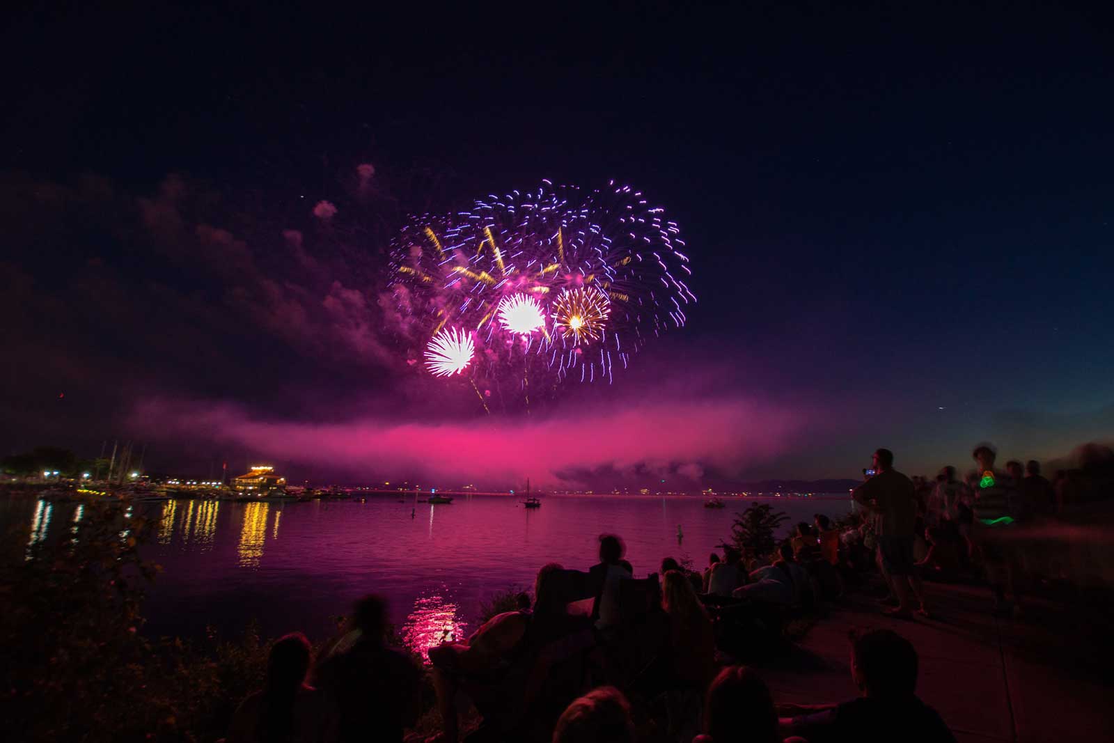 A photo of fireworks at the Burlington Waterfront in Vermont by Kevin Davison via Unsplash